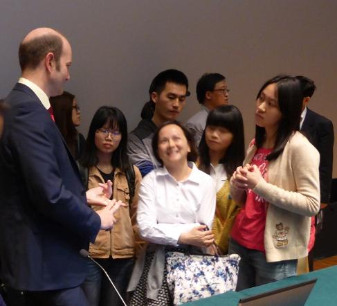 Michael White meeting students in China